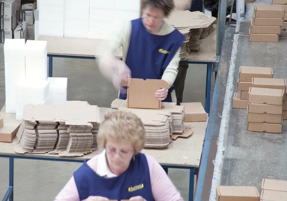 Our history Staff manufacturing boxes at AE Sutton Ltd